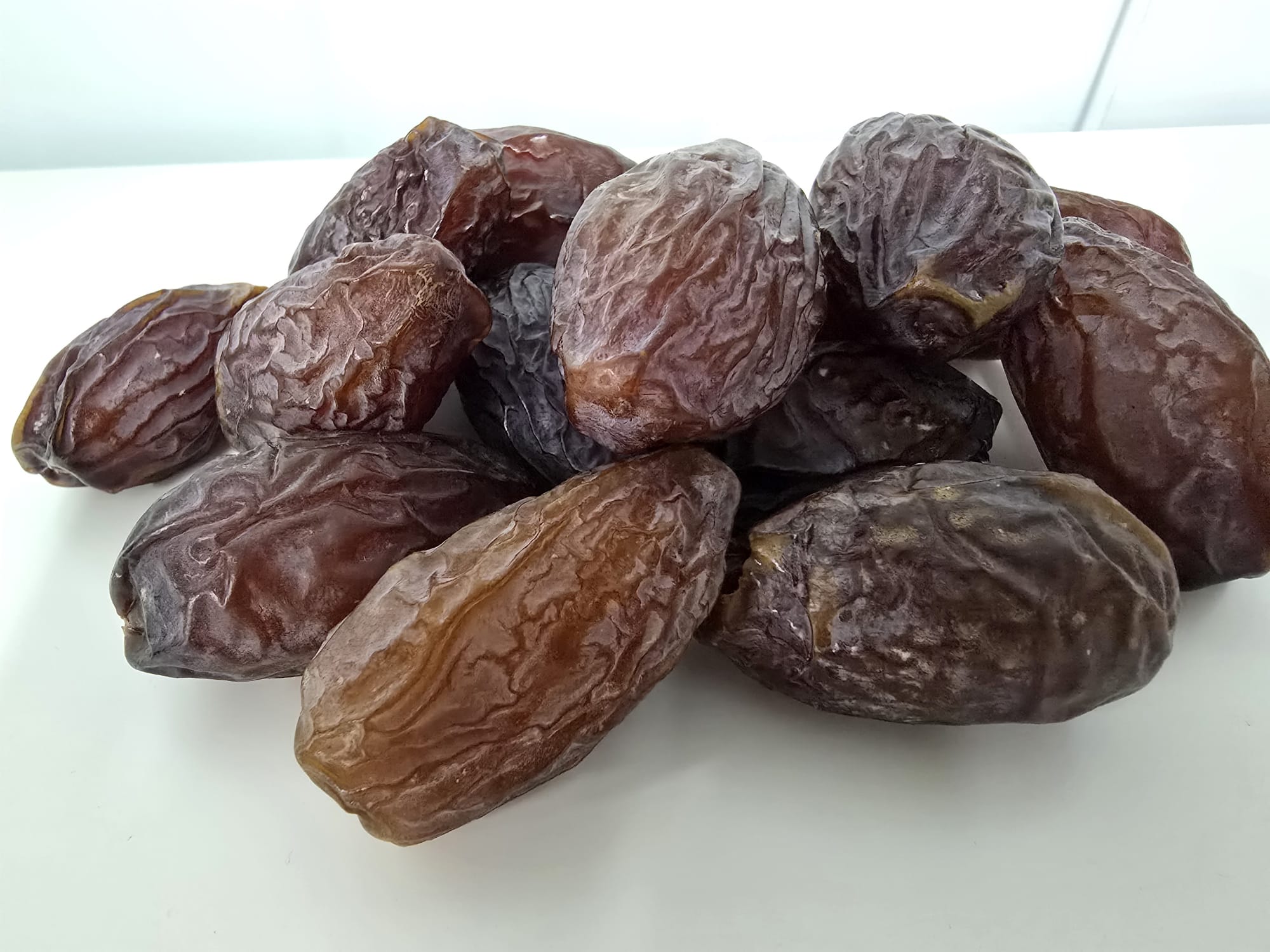 Real MEDJOYA jumbo Medjool dates, photographed at the packing house