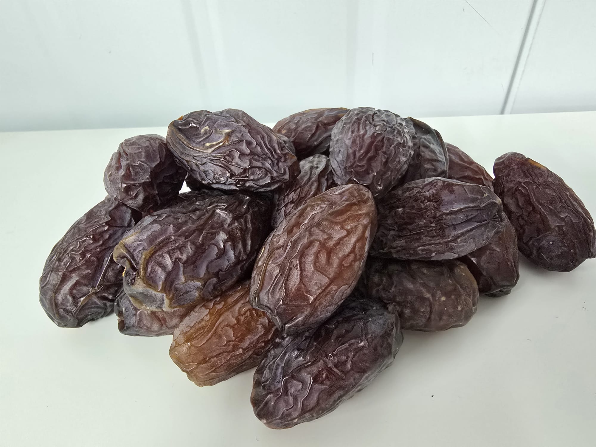Close-up of real Medjool dates from the family orchard